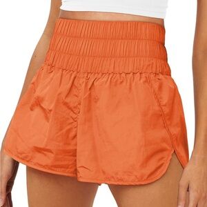 Bright orange athletic shorts
